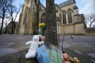 Police officers outside All Saints Church in Notting Hill, London, where a newborn baby was found dead in a shopping bag
