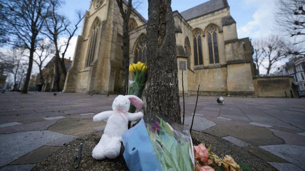 Police officers outside All Saints Church in Notting Hill, London, where a newborn baby was found dead in a shopping bag