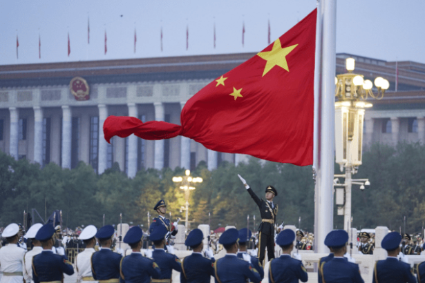 Chinese Honour Guard Raises National Flag at Tiananmen Square in Patriotic Ceremony