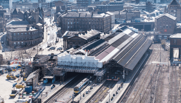 Huddersfield railway station platforms and tracks undergoing renovation during the Transpennine Route Upgrade works.