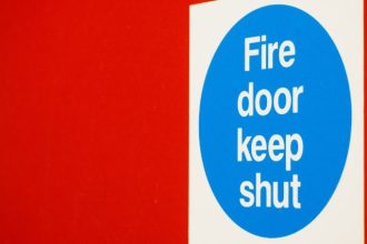 What Does a Sign in a Blue Circle Mean in Fire Safety