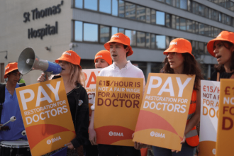 Resident doctors picket outside Guys and St Thomas Hospital in London on a previous strike in 2024