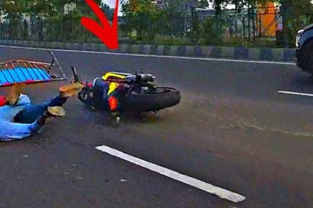 Motorcyclist hits road barrier