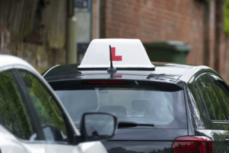 Learner's Board over a Car